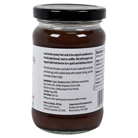 Jar of Welsh Lady Raspberry curd with a white label on a white background