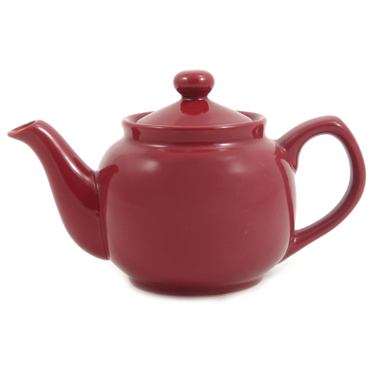 Red teapot on a white background