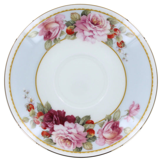 Bone china decorative plate with floral design on a white background