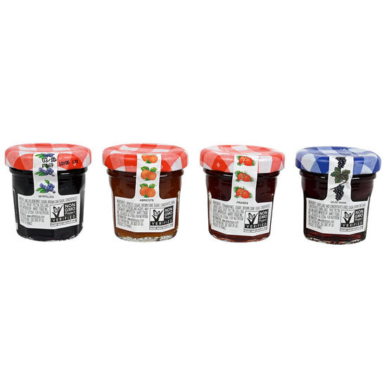 Set of jam jars with checkered lids on a white background