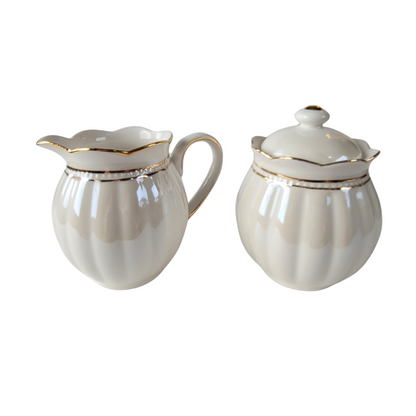 Luster Gold Porcelain gold trimmed cream and sugar bowl set on a white background