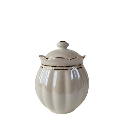 Luster Gold Porcelain gold trimmed sugar bowl with lid on all on a white background