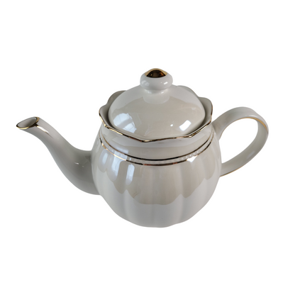 Luster Gold Porcelain gold trimmed teapot with lid on a white background