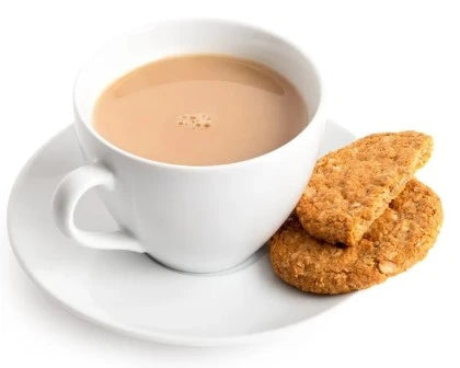 White cup of tea with a saucer and two cookies on a white background