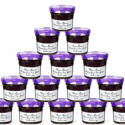 A stacked pyramid of 15 jars of grape flavored Bonne Maman fruit spread.