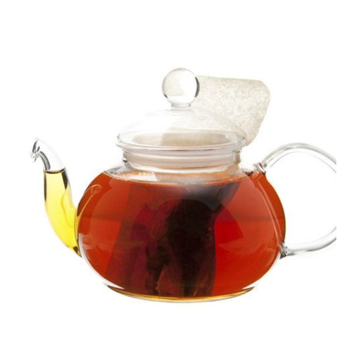 Glass teapot filled with hot tea and a teabag on a white background.