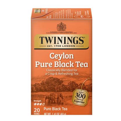 Twinings Ceylon Pure Black Tea orange packaging on a white background