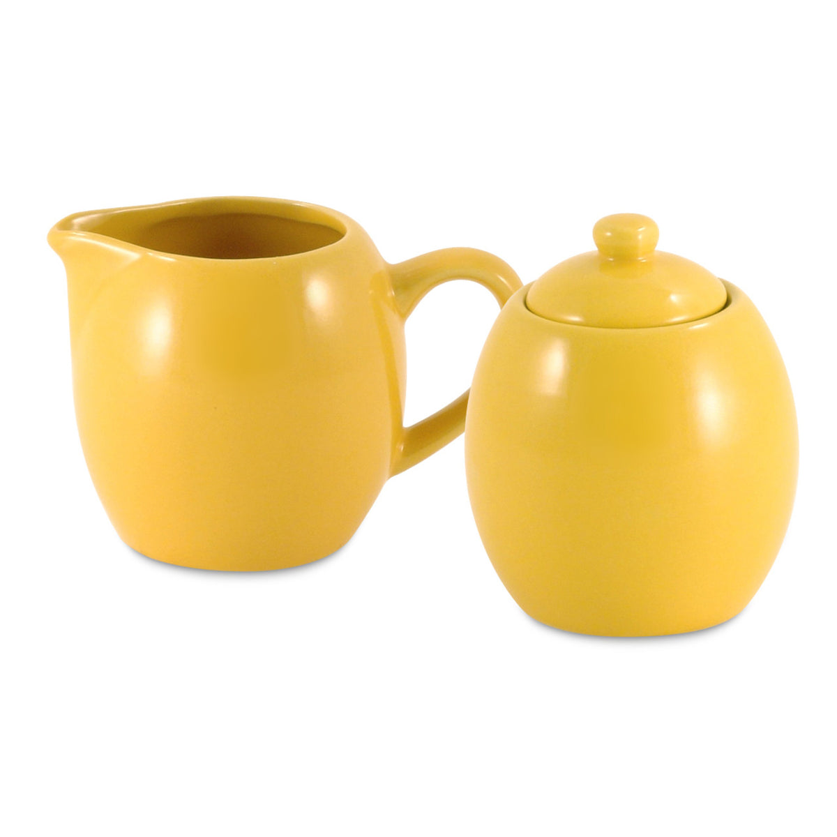 Yellow ceramic creamer and sugar bowl set on a white background