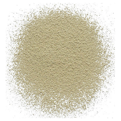 White matcha tea powder in a splatter on a white background