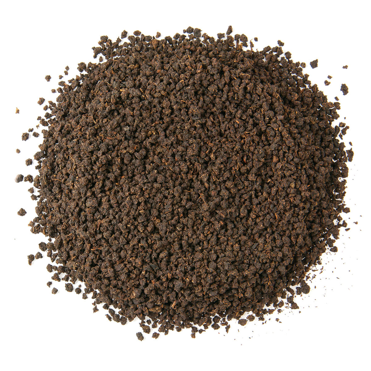Dry coarse black tea leaves.