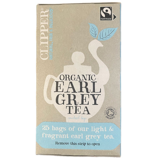 Box of Clipper Organic Earl Grey Tea with branding and certification logos on a beige background
