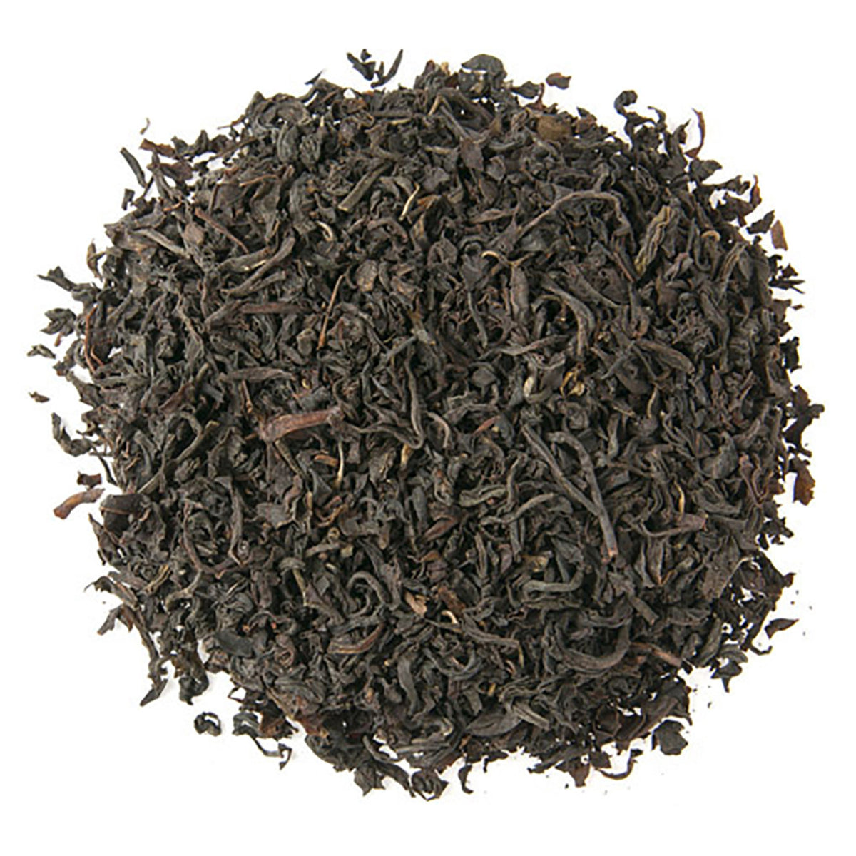 A pile of loose leaf Scottish breakfast tea on a white background.