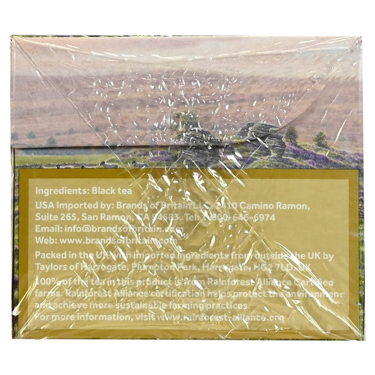 Tea packaging with a scenic image and ingredient list on a white background
