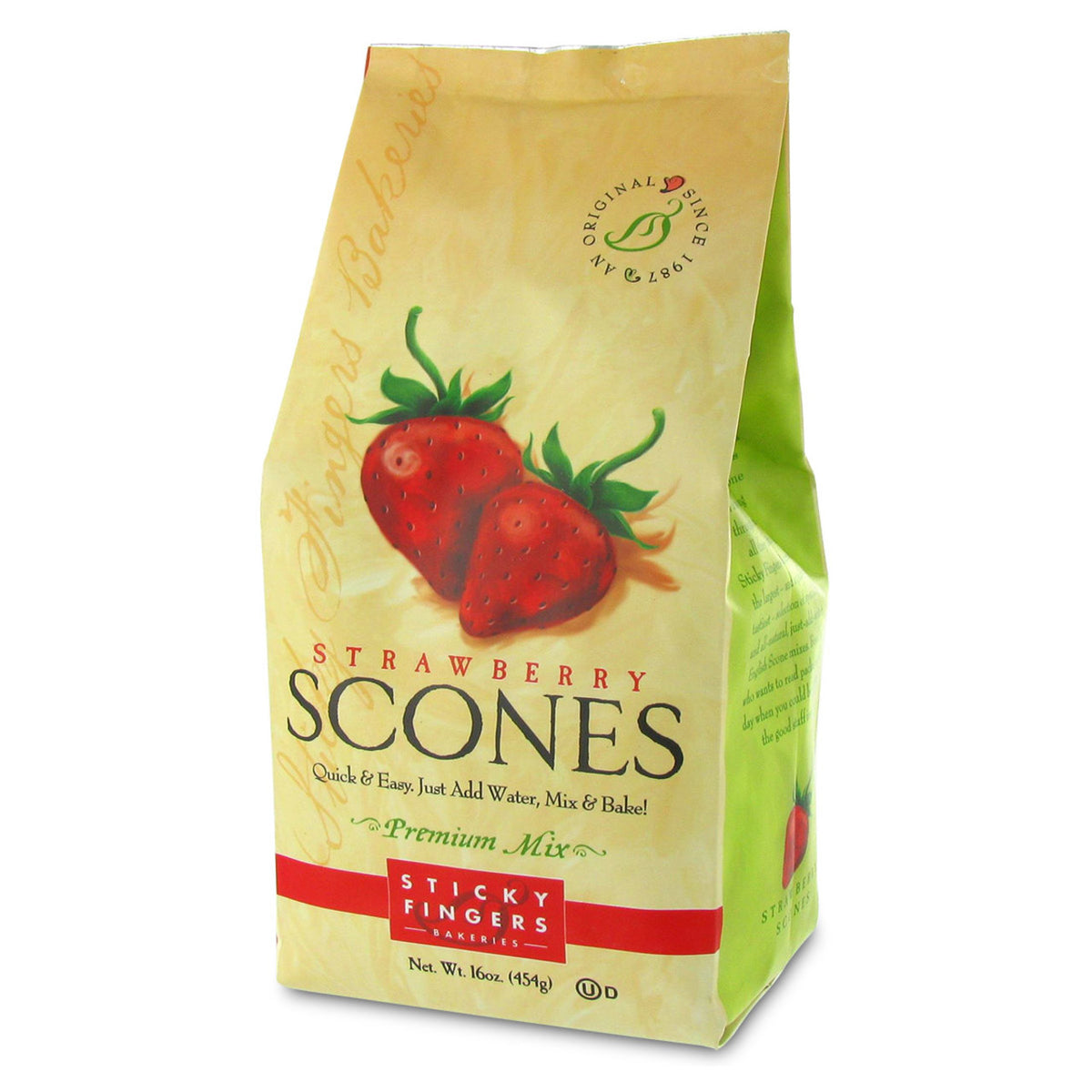 Bag of Strawberry Scones mix with red strawberries on a yellow background