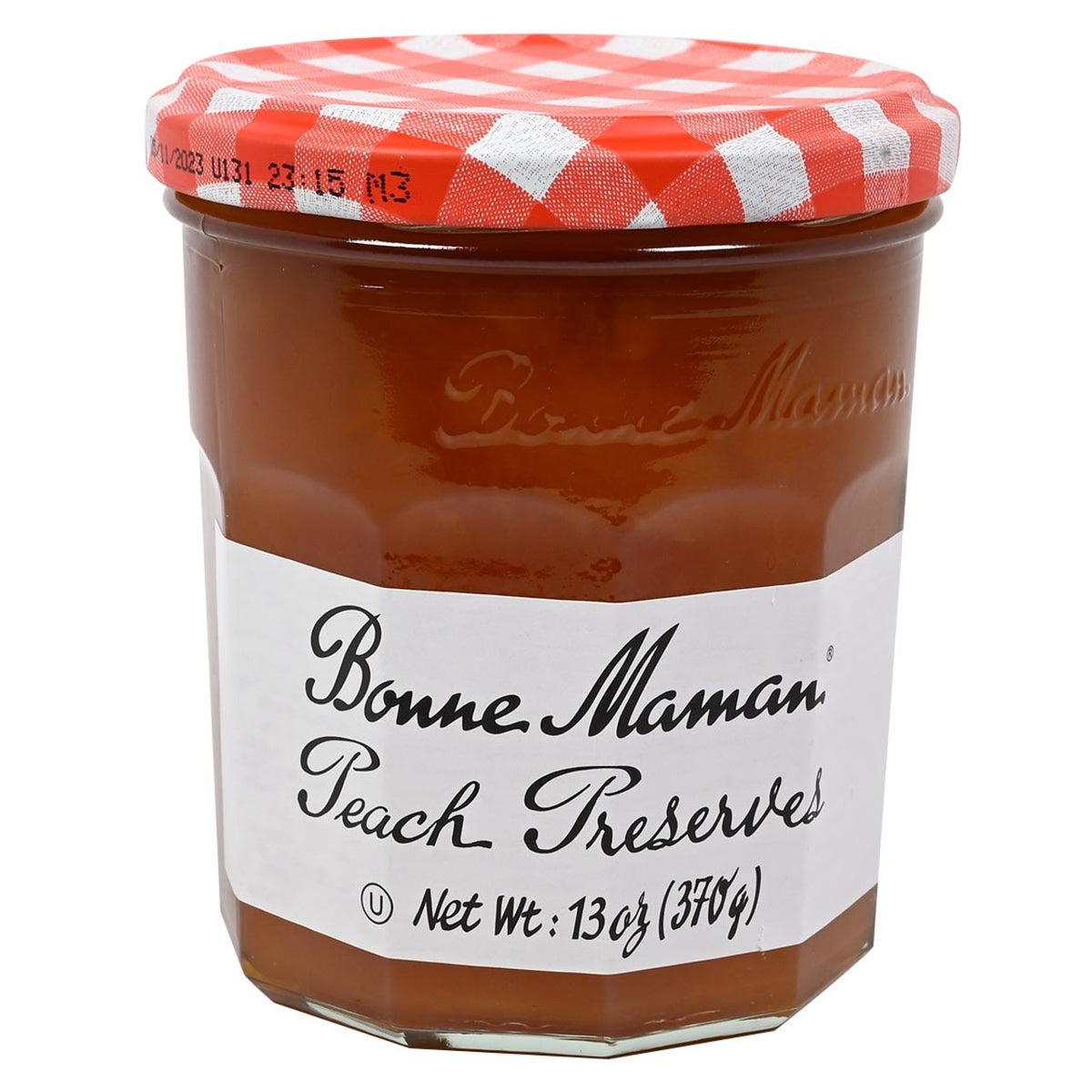 Jar of Bonne Maman Peach Preserves with a red and white checkered lid on a white background