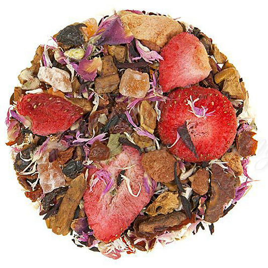 Drive tea leaves in a circle with dried strawberry and leafy tea mix on a white background