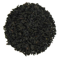 A close-up of loose leaf organic wild blueberry black tea.