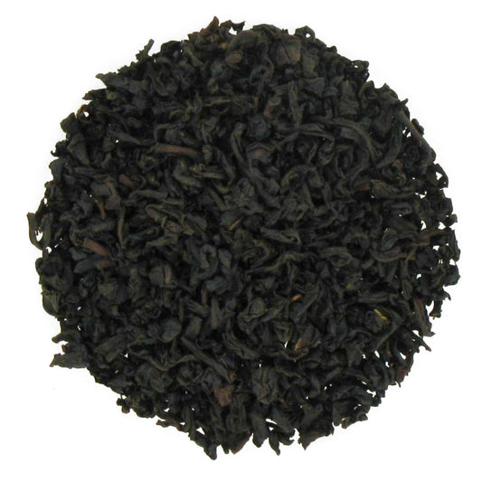 A close-up of loose leaf organic wild blueberry black tea.