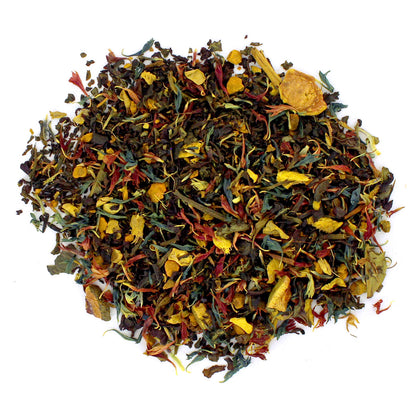 Colorful mix of loose-leaf tea leaves on a white background