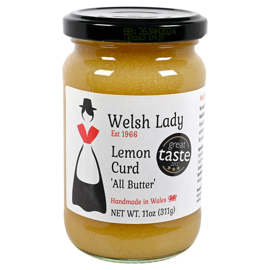 Jar of Welsh Lady Lemon Curd with a black lid on a white background