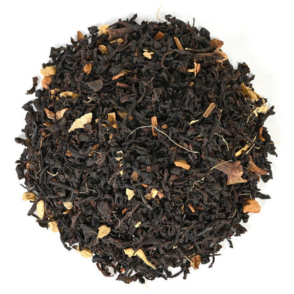 Loose-leaf black tea mixed with marigold and brown petals.
