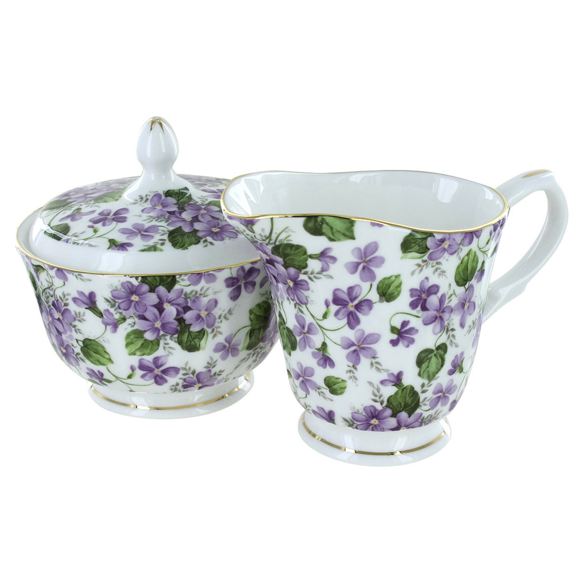 Tea set with floral design on a white background