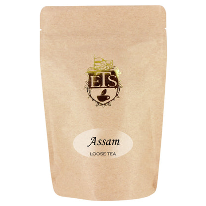 Kraft paper packaging of Assam loose tea with a logo on a white background