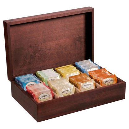Wooden tea box opened displaying colorful individually wrapped Twinings teabags