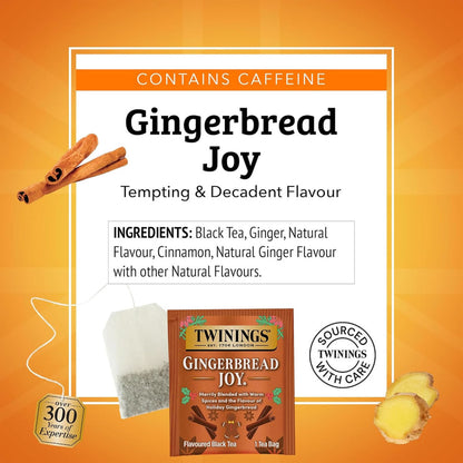 Gingerbread Joy tea packaging with cinnamon sticks, ginger, and Twinings logo on an orange background.