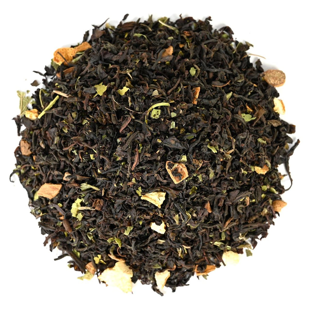 Close-up of loose-leaf black tea leaves on a white background