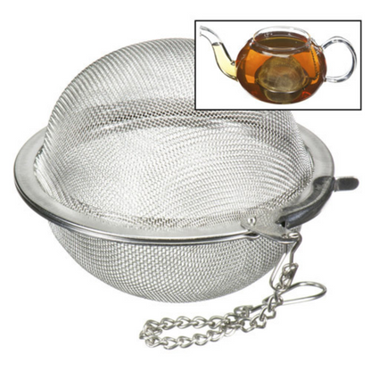 Metal tea ball infuser with a inset of tea being brewed.