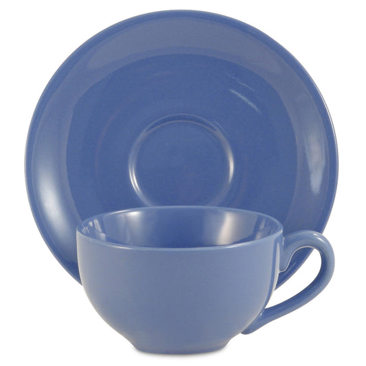 Blue ceramic cup and saucer set on a white background