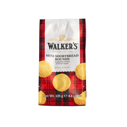 Pack of Walker's Mini Shortbread Rounds on a red plaid patterned background