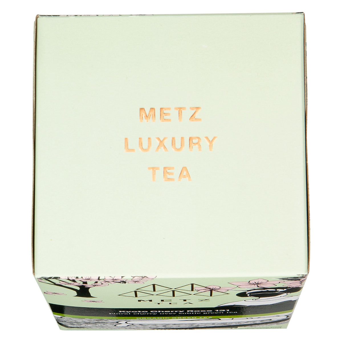 Top of a tea box packaging with floral design and 'Metz Luxury Tea' text on a white background