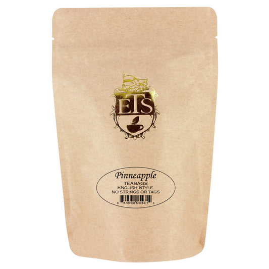 Kraft paper packaging of pineapple tea bags with the ETS logo and text on a white background
