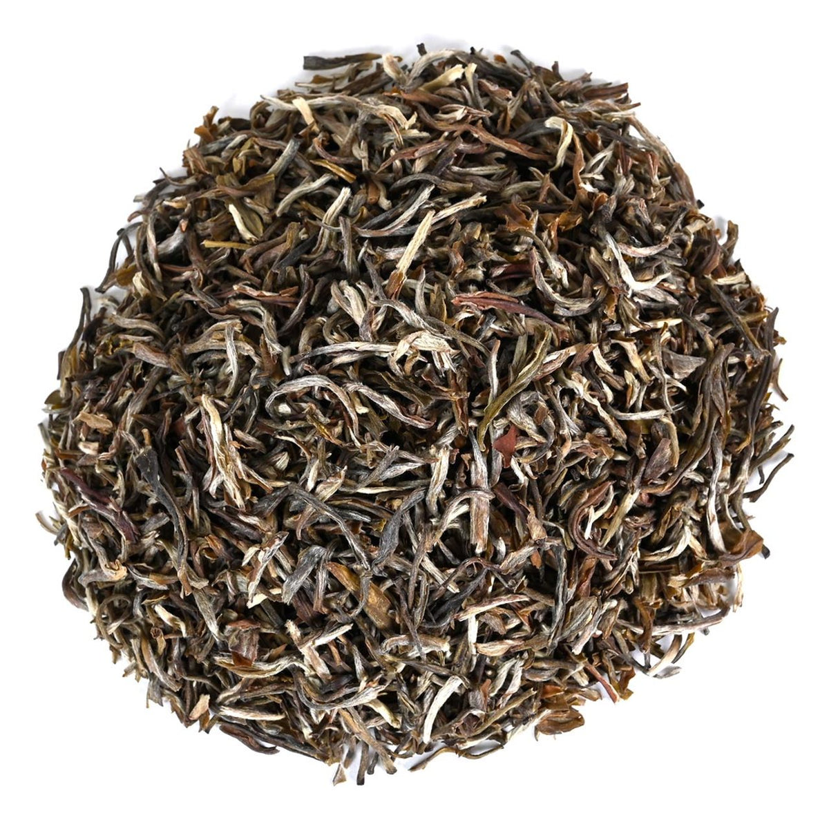 Close-up of dried tea leaves on a white background
