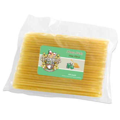 Packaged honey sticks with a visible brand label on a white background