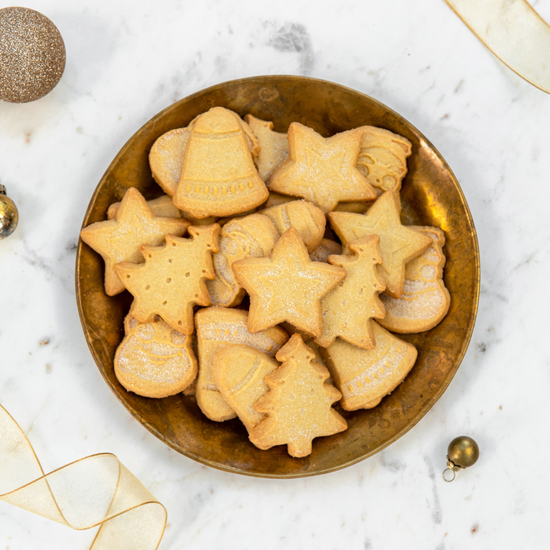 Plate of various holiday shaped Walker's Shortbread cookies