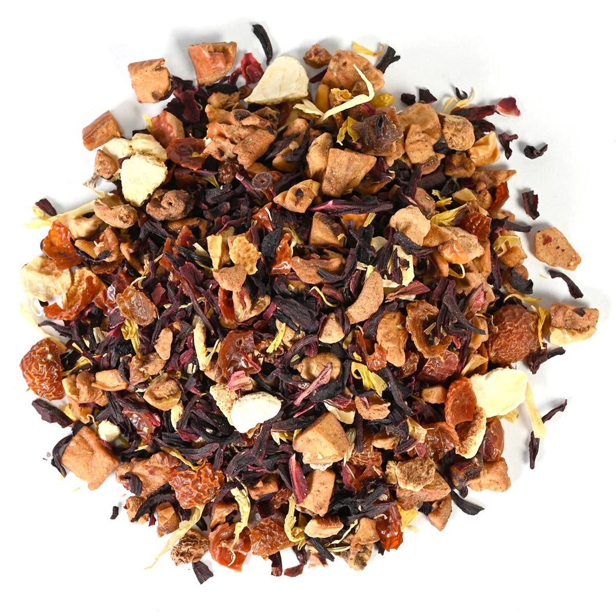 A pile of loose-leaf herbal tisane mixed with chunky dried fruit pieces.