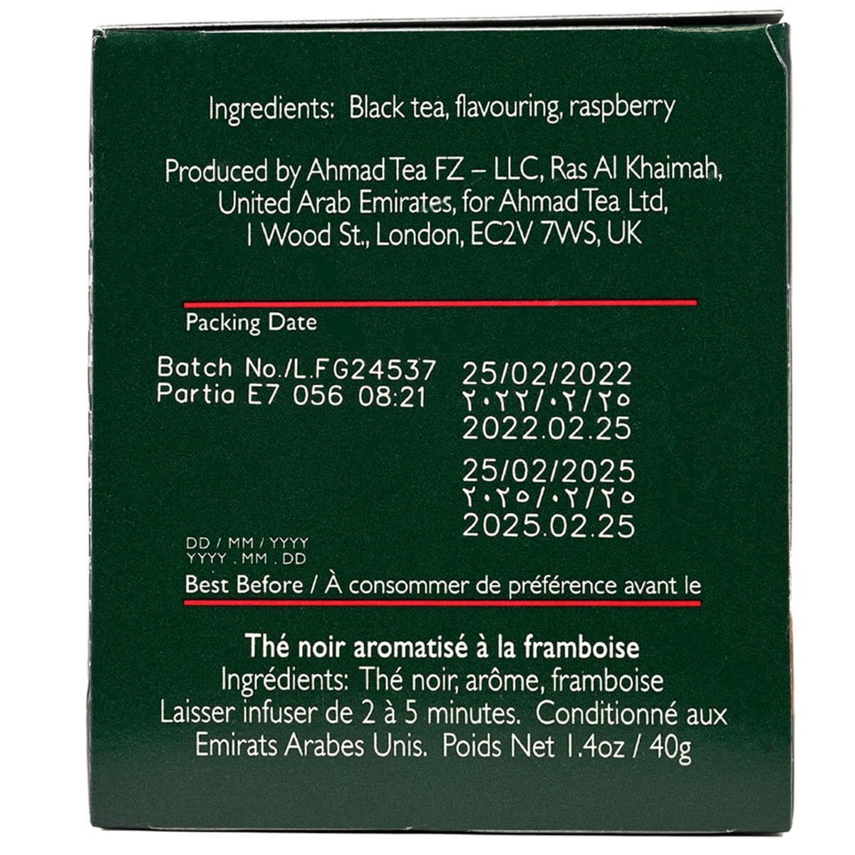 Side view of a box of Ahmad Tea Raspberry Indulgence black tea packaging with raspberries on a white background