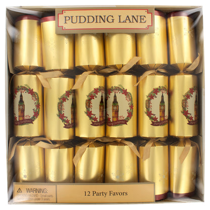 Box of gold party favors with 'Pudding Lane' branding and decorative designs.