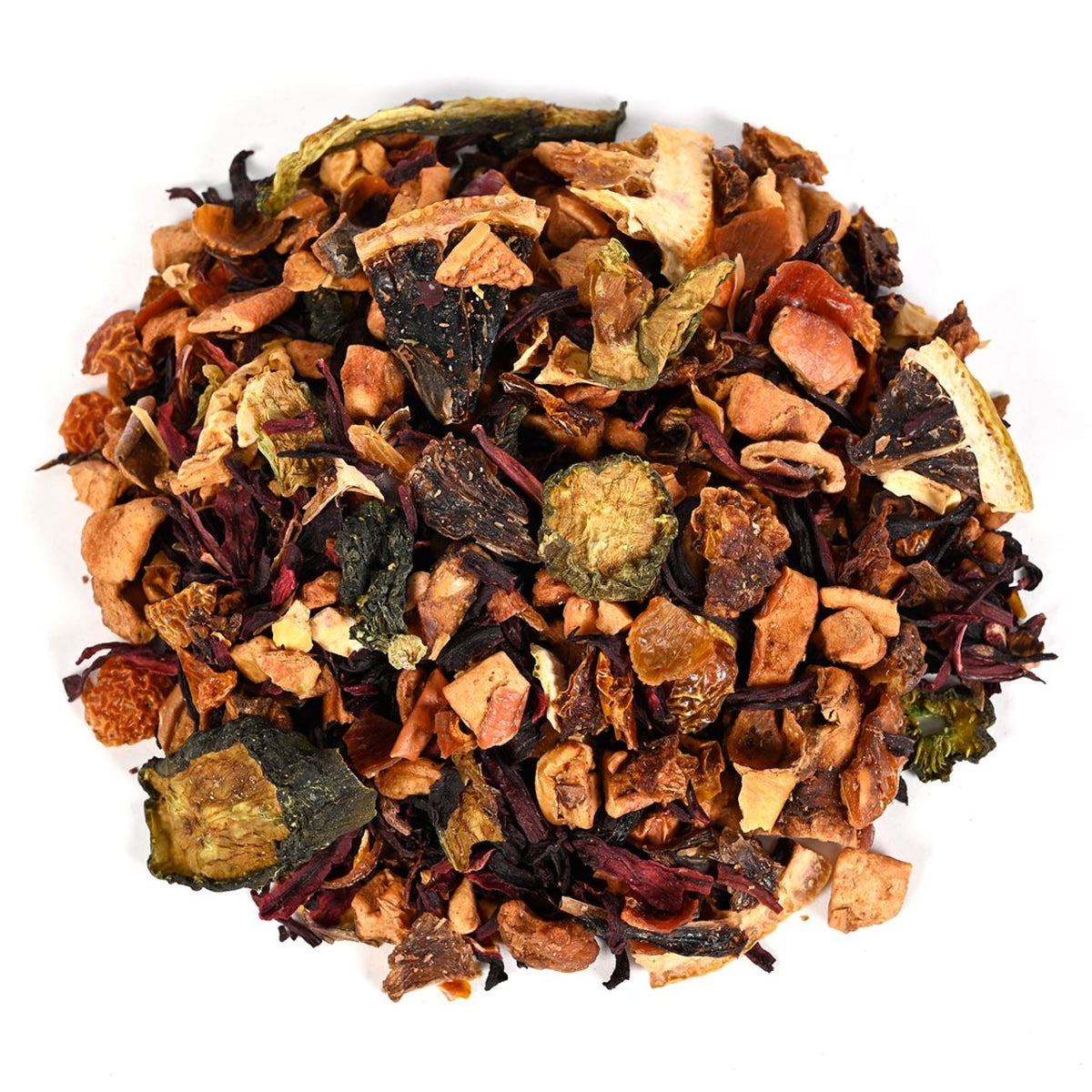 Assorted dried tea leaves, fruit pieces, and spices on a white background