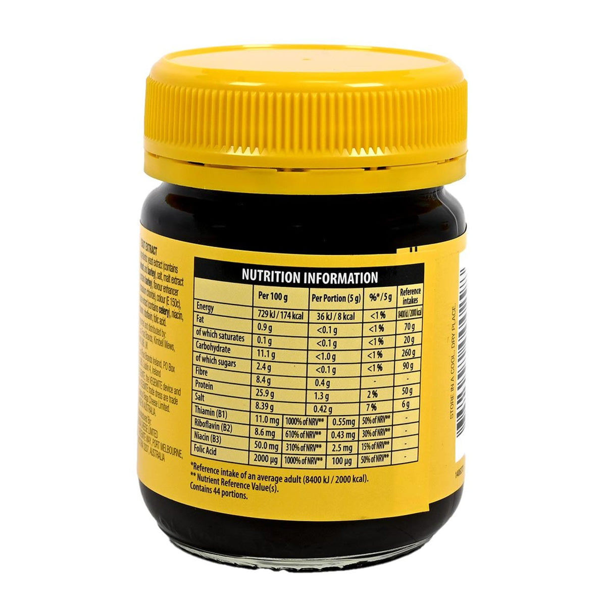 Yellow jar of Vegemite with nutrition label on a white background