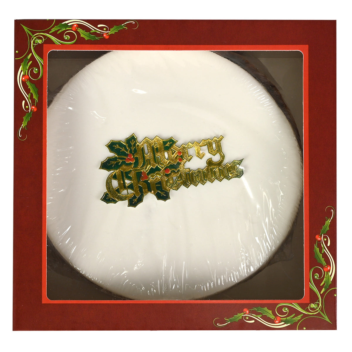 A red box of Norfolk Manor Christmas Fruit Cake with a translucent plastic window displaying the white icing of the cake with a decorative Merry Christmas topper.