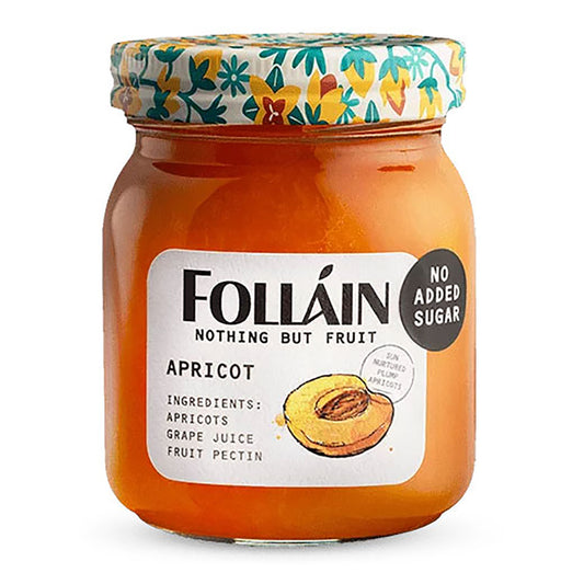 Jar of Folláin apricot spread with a floral lid on a white background