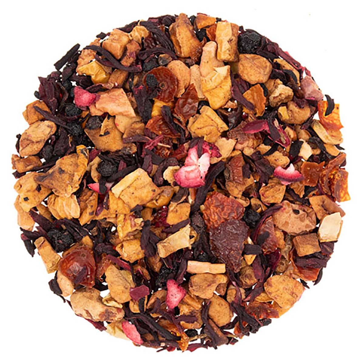 Assorted dried fruit and tea leaves on a white background