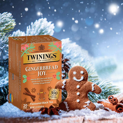 Twinings Gingerbread Joy tea box with a gingerbread man and snowy background
