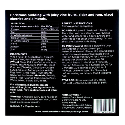 Back side of a box of Luxury Christmas Pudding with nutrition facts, ingredients, and reheat instructions.