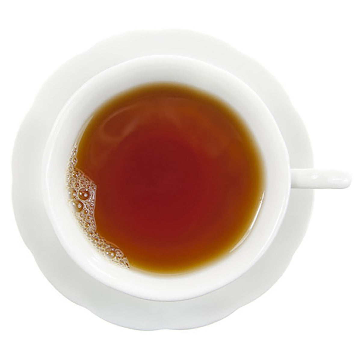 White cup with dark hot tea on a white background