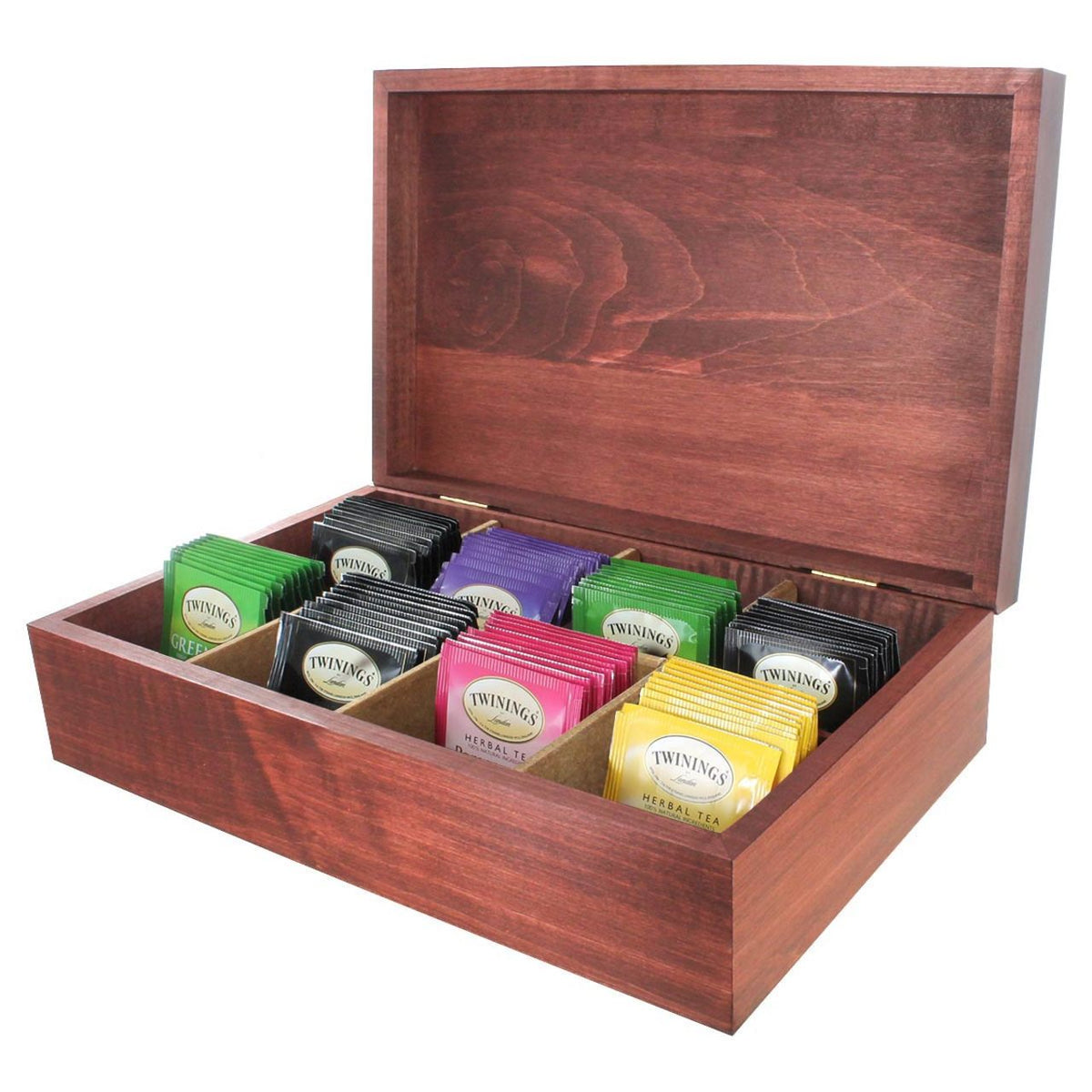 Wooden tea box opened displaying colorful individually wrapped Twinings teabags